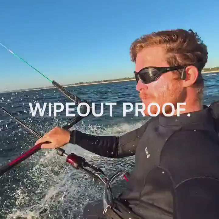 AONIC Flow waterproof headphones staying on through a kitesurfing wipeout